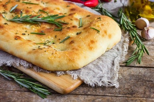 Italian focaccia bread with rosemary and garlic